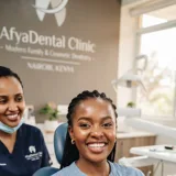 Portrait of an African woman smiling brightly after gentle dental treatment at AfyaDental clinic in Nairobi